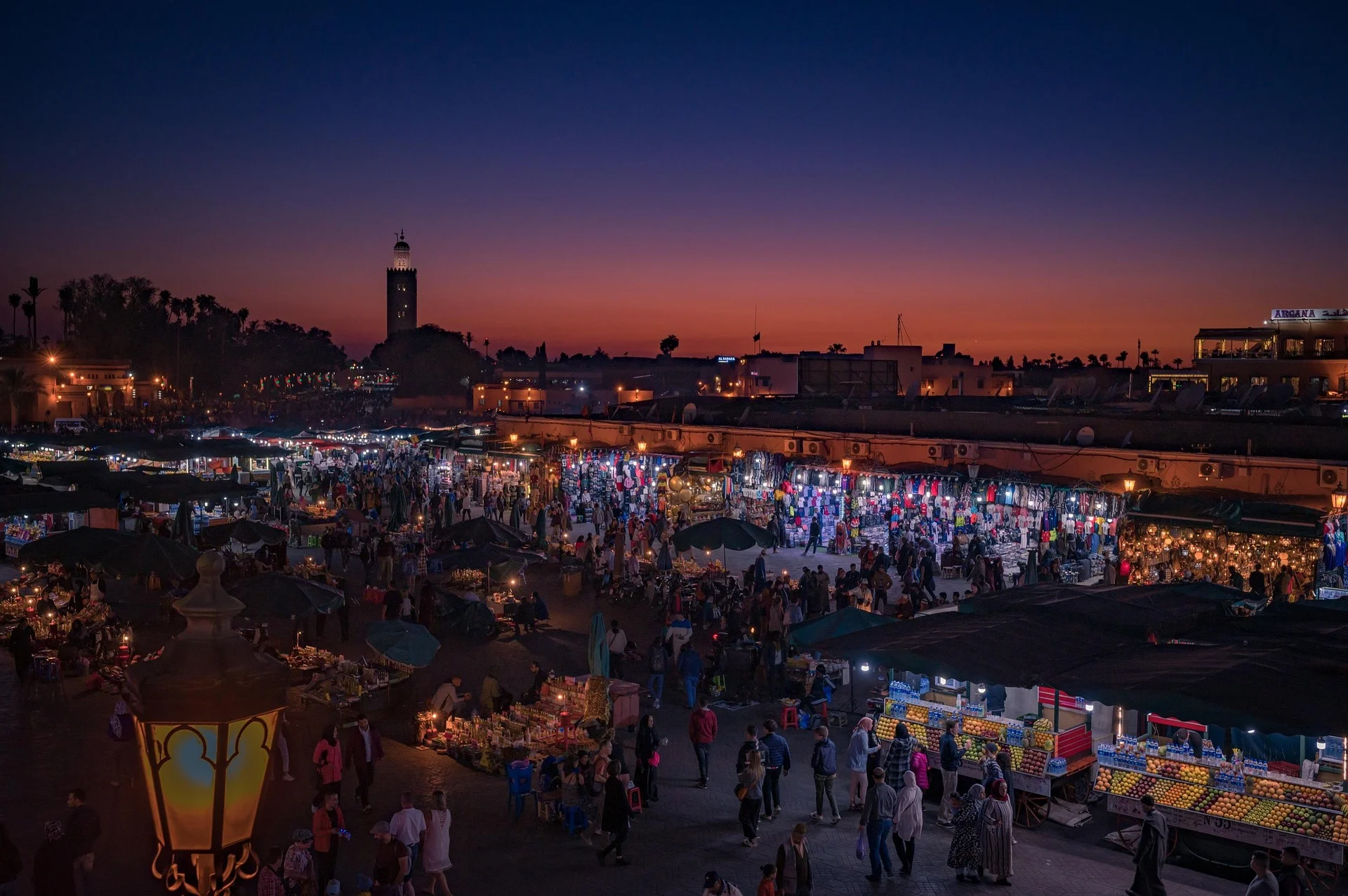 Jemaa el-Fna square in Marrakech at dusk, the starting point of our private Morocco tours